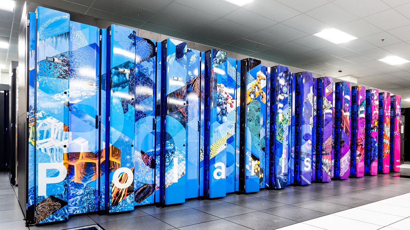 Argonne National Laboratory’s colorful Polaris supercomputer cabinets in an archival U.S. Department of Energy photograph.